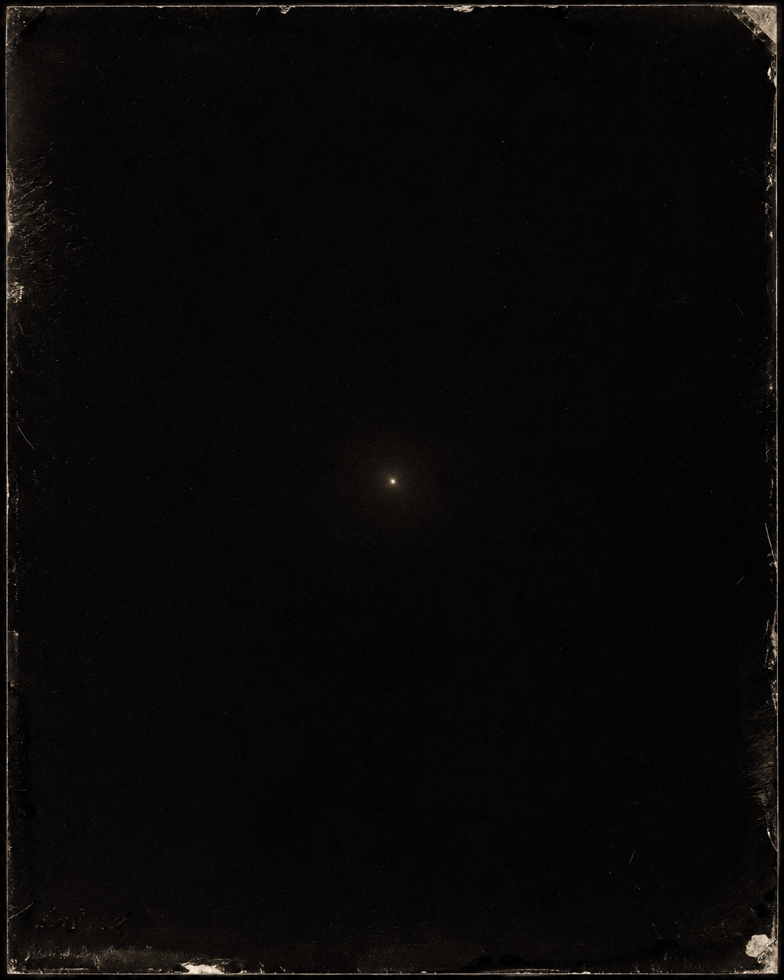 A single faint star at the center of an otherwise empty archival photographic plate, its emulsion scratched at the edges.